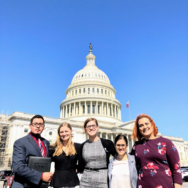 Voices for Science participants stand in front of the US Capitol, Washington, DC