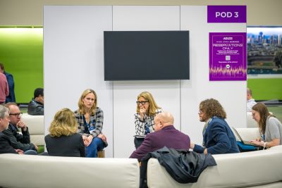 A group of AGU Annual Meetings attendees converse in a Pod they have reserved.